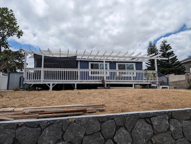 view of front of house featuring a deck and a pergola