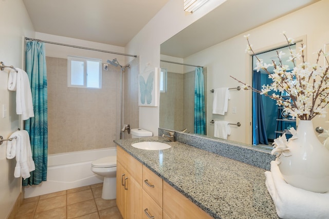 full bathroom featuring vanity, toilet, shower / bath combo, and tile patterned flooring