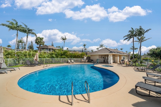 view of swimming pool featuring a patio area