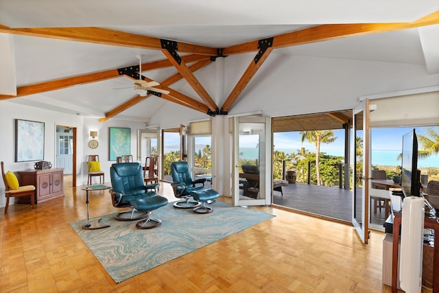 living room with beamed ceiling, ceiling fan, and high vaulted ceiling