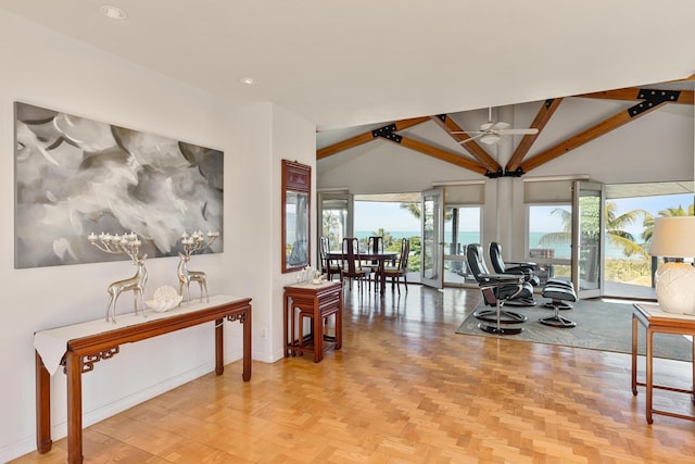 living room with ceiling fan and lofted ceiling with beams