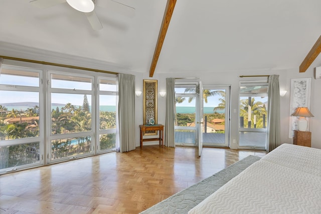 bedroom with access to outside, multiple windows, ceiling fan, and light parquet floors