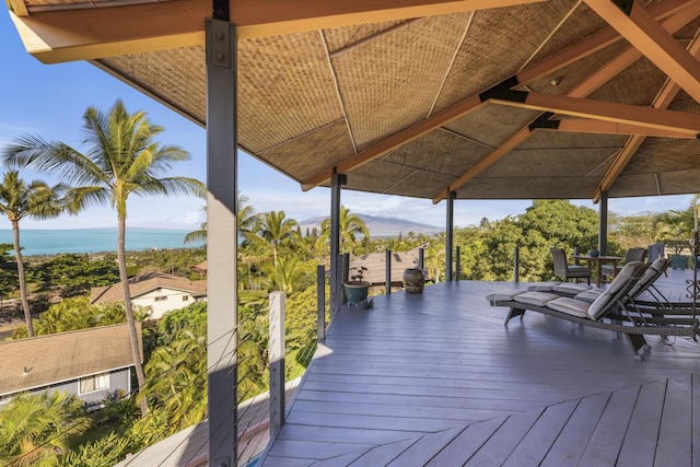 wooden deck with a water view