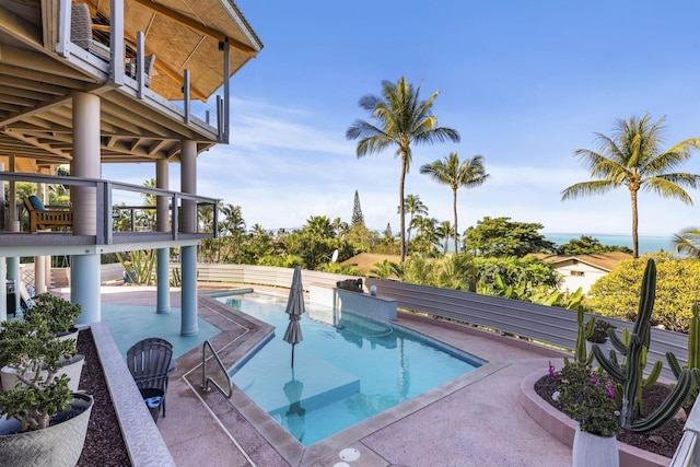 view of swimming pool featuring a patio area