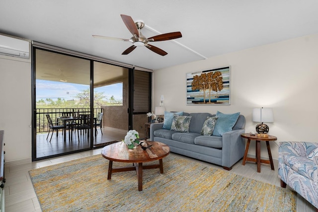 living room with expansive windows, ceiling fan, and a wall unit AC