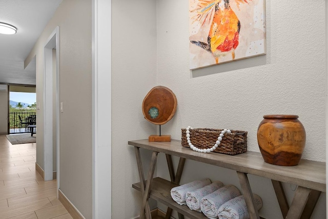 hallway featuring expansive windows