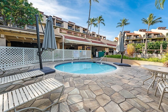 view of swimming pool featuring a patio