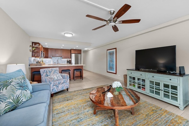 living room with ceiling fan