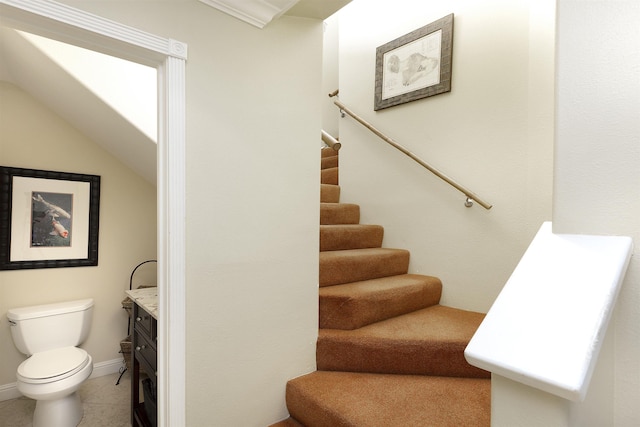 stairs with tile patterned floors