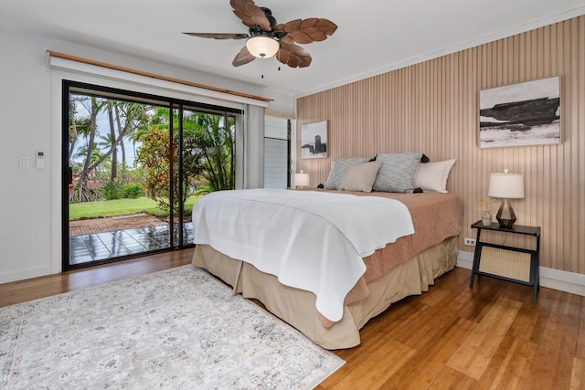 3788 Lower Honoapiilani Rd Unit C102, Lahaina, HI 96761 - bedroom with access to exterior, wood finished floors, and baseboards