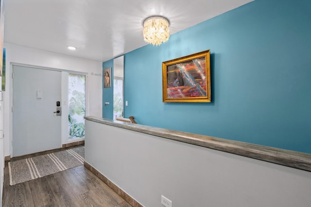 3788 Lower Honoapiilani Rd Unit C102, Lahaina, HI 96761 - foyer with wood finished floors, a chandelier, and baseboards