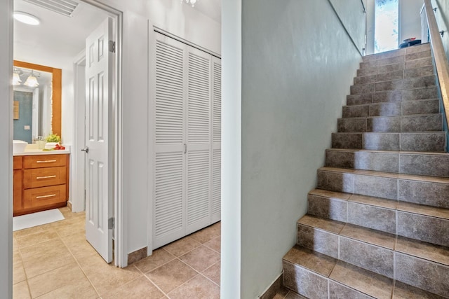 3788 Lower Honoapiilani Rd Unit C102, Lahaina, HI 96761 - stairs featuring tile patterned floors and baseboards