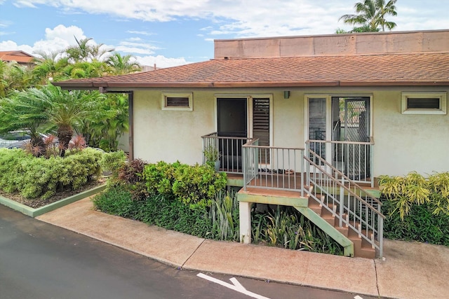3788 Lower Honoapiilani Rd Unit C102, Lahaina, HI 96761 - view of exterior entry featuring stucco siding