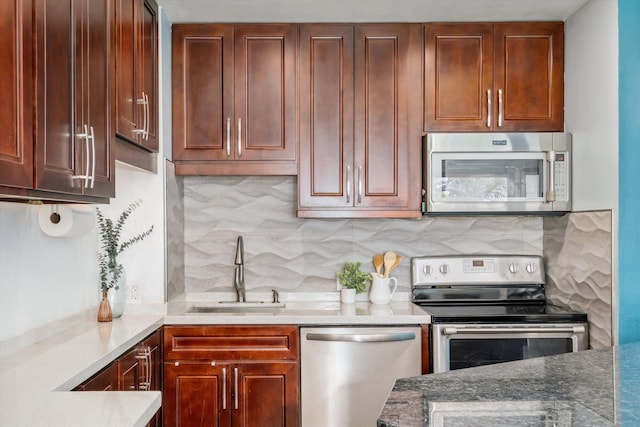 3788 Lower Honoapiilani Rd Unit C102, Lahaina, HI 96761 - kitchen featuring stainless steel appliances, a sink, and decorative backsplash