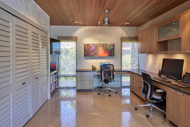 office area with built in desk and wooden ceiling