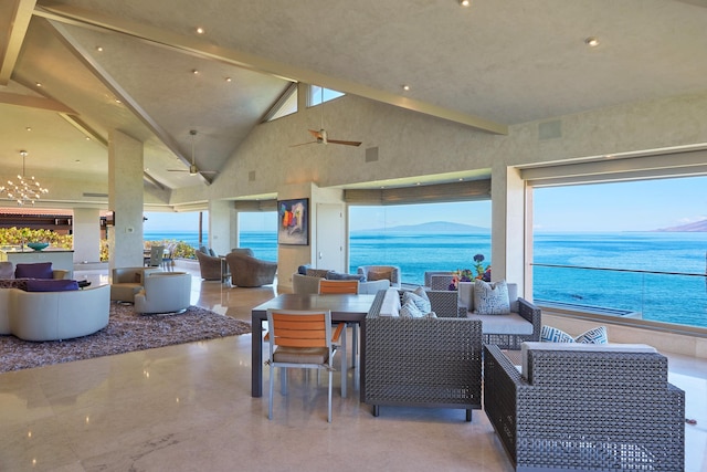 view of patio / terrace featuring a water and mountain view, outdoor lounge area, and ceiling fan