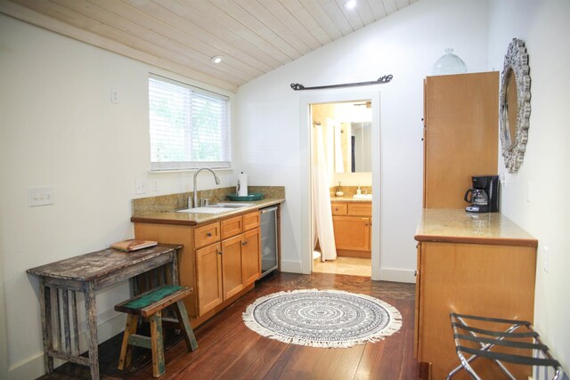 kitchen with lofted ceiling, wood ceiling, dark hardwood / wood-style flooring, wine cooler, and sink