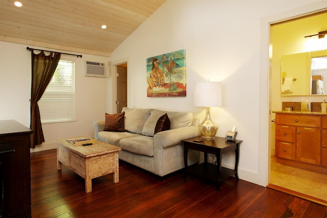 living room featuring dark hardwood / wood-style flooring, lofted ceiling, and a wall mounted air conditioner