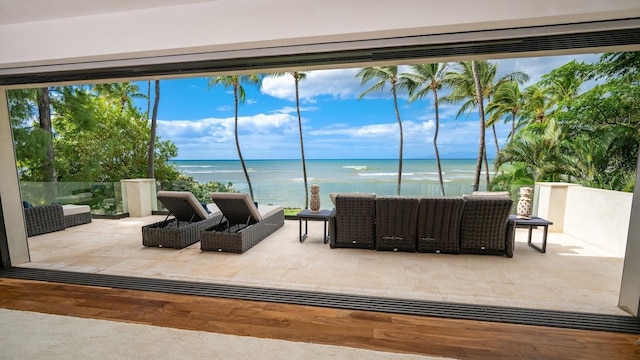 view of patio featuring an outdoor hangout area and a water view