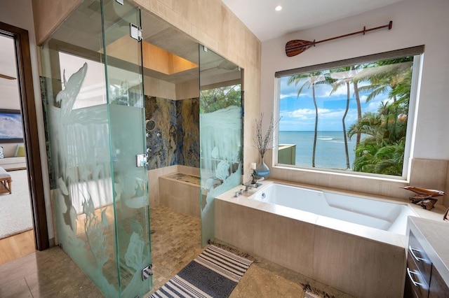 bathroom featuring a water view, tile patterned flooring, a wealth of natural light, and plus walk in shower