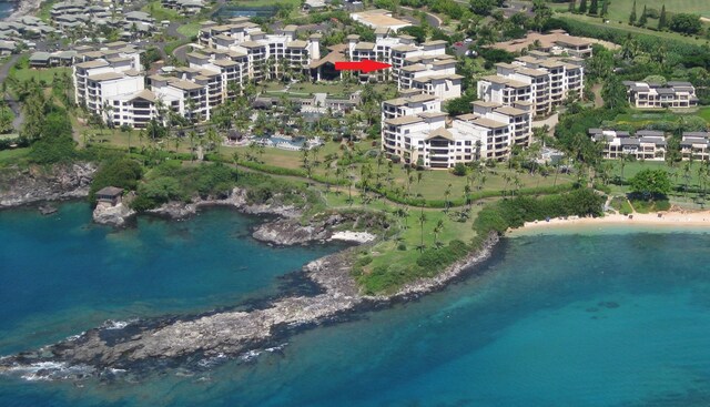 drone / aerial view with a water view