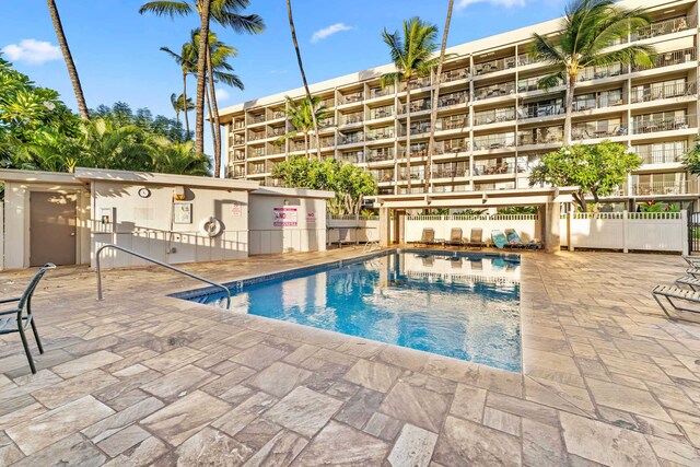 view of pool featuring a patio area