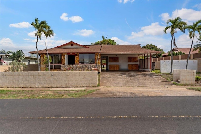 ranch-style house with a carport