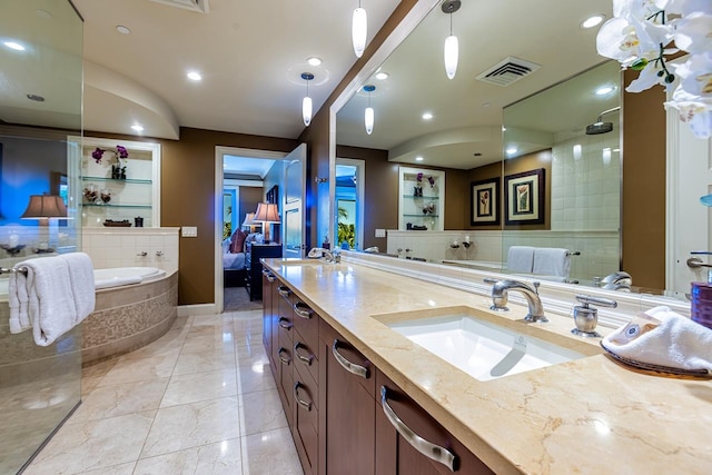 bathroom with decorative backsplash, vanity, plus walk in shower, and tile patterned floors