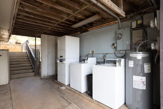 471 Liholiho St Unit 23, Wailuku, HI 96793 - washroom featuring water heater, estacked washer and dryer, and washer and clothes dryer