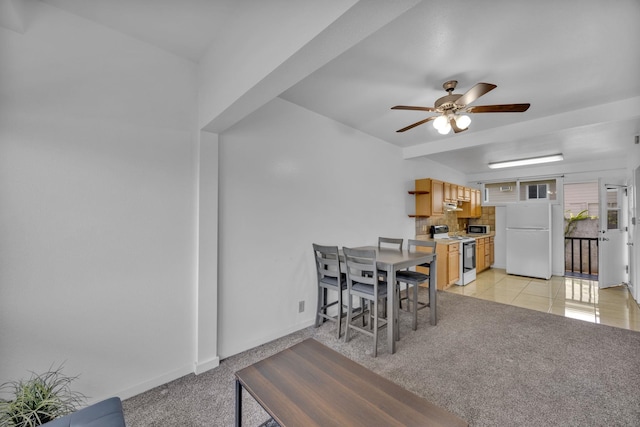 471 Liholiho St Unit 23, Wailuku, HI 96793 - dining space with a ceiling fan and light carpet