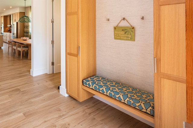 mudroom with light wood-type flooring