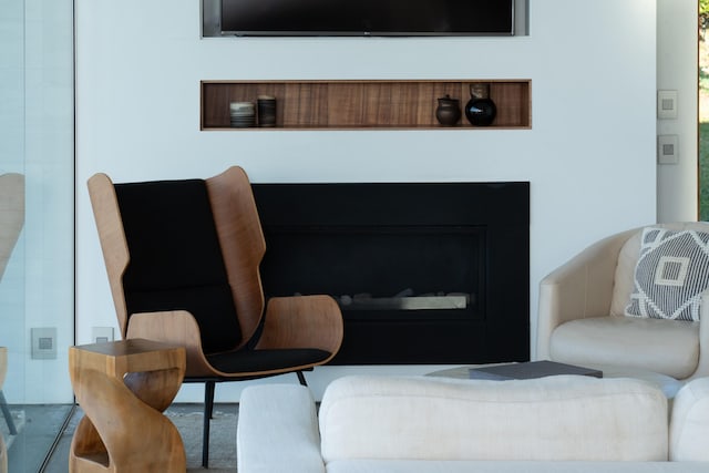 living room featuring a fireplace