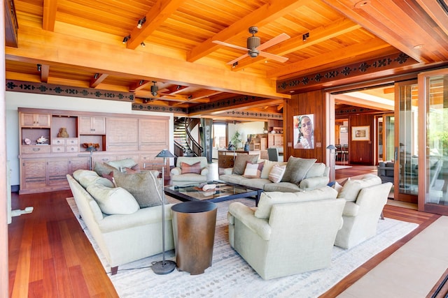 living room featuring hardwood / wood-style floors, ceiling fan, a healthy amount of sunlight, and wooden ceiling