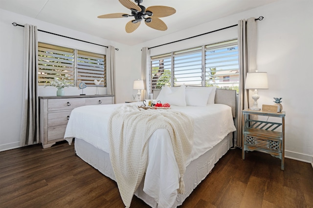 bedroom featuring dark hardwood / wood-style floors and ceiling fan