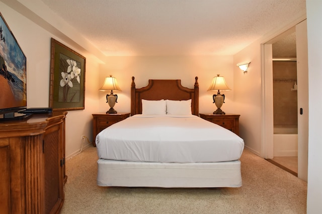 carpeted bedroom with a textured ceiling