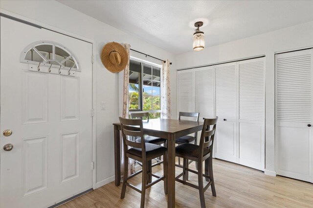 dining room featuring light wood-type flooring