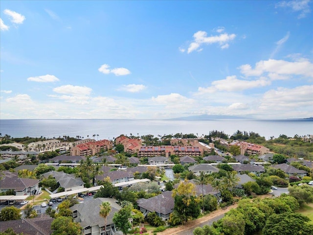 birds eye view of property with a water view and a residential view