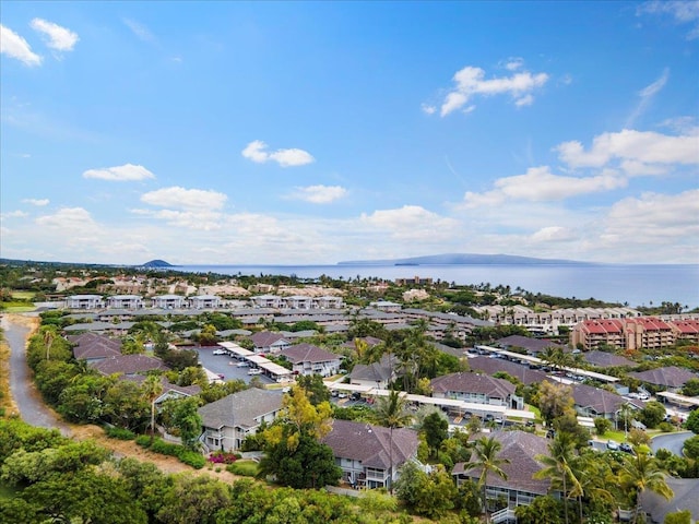 aerial view with a residential view and a water view