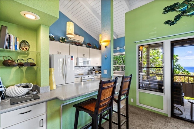 10 Wailea Ekolu Pl Unit 1008, Kihei, HI 96753 - kitchen with white appliances, carpet flooring, white cabinetry, beam ceiling, and backsplash