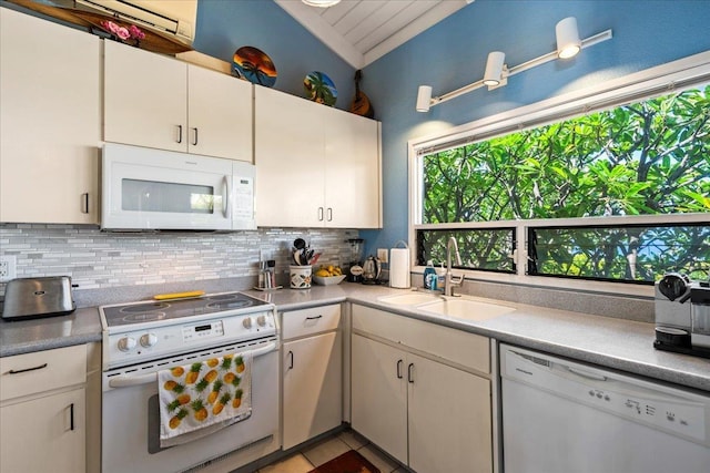 10 Wailea Ekolu Pl Unit 1008, Kihei, HI 96753 - kitchen featuring white appliances, decorative backsplash, a sink, and light countertops