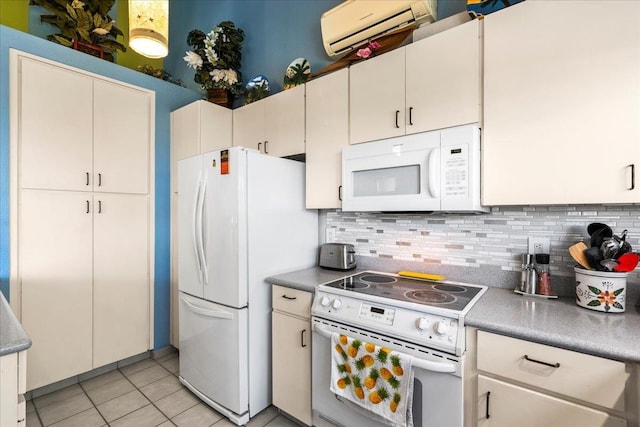 10 Wailea Ekolu Pl Unit 1008, Kihei, HI 96753 - kitchen with white appliances, tasteful backsplash, light tile patterned floors, and a wall unit AC