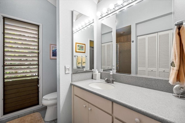 10 Wailea Ekolu Pl Unit 1008, Kihei, HI 96753 - full bath with a closet, toilet, vanity, and a textured wall