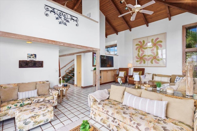 tiled living room with wooden ceiling, beamed ceiling, high vaulted ceiling, and ceiling fan