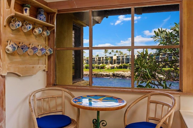 living area with a water view