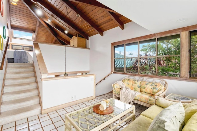 unfurnished living room with wooden ceiling, high vaulted ceiling, beam ceiling, and light tile patterned floors