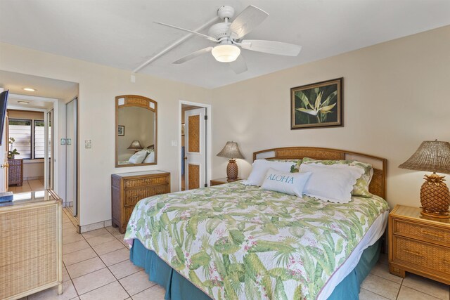 3723 Lower Honoapiilani Rd Unit 302, Lahaina, HI 96761 - bedroom with light tile patterned flooring and a ceiling fan