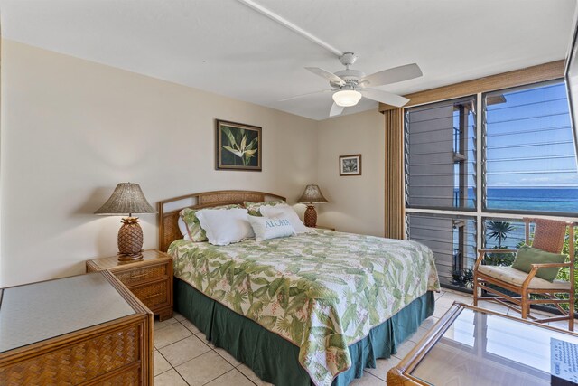 3723 Lower Honoapiilani Rd Unit 302, Lahaina, HI 96761 - bedroom with light tile patterned floors, multiple windows, and a ceiling fan
