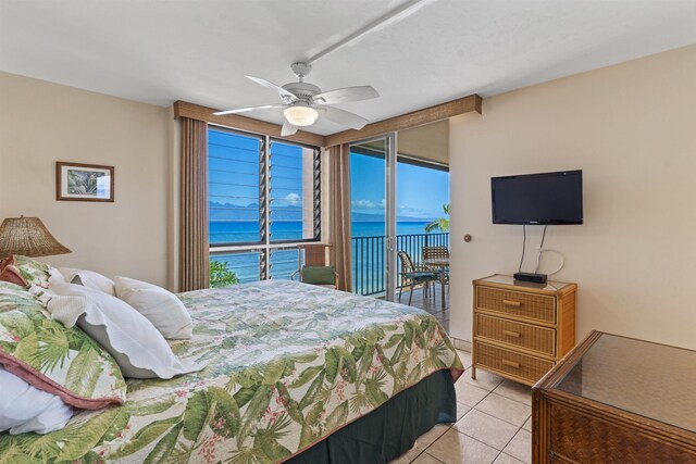 3723 Lower Honoapiilani Rd Unit 302, Lahaina, HI 96761 - bedroom with access to exterior, light tile patterned floors, a ceiling fan, and a wall of windows