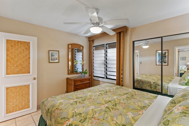 bedroom with light tile patterned floors and ceiling fan