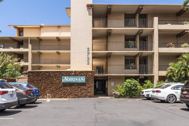 3723 Lower Honoapiilani Rd Unit 302, Lahaina, HI 96761 - view of apartment building / complex featuring uncovered parking